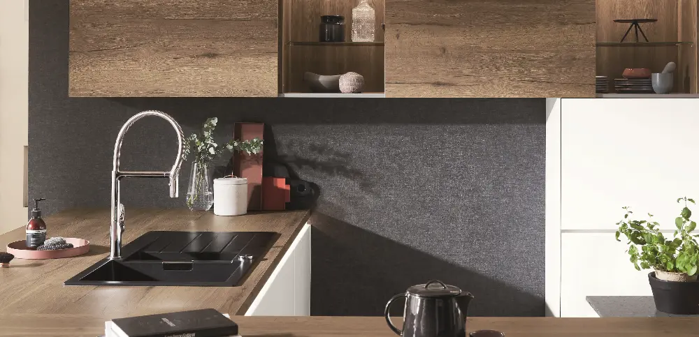 Corner of a white/wooden kitchen with focus on the Sink Corner of a white/wooden kitchen with focus on the Sink